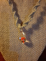Orange Glass Mushroom Necklace.